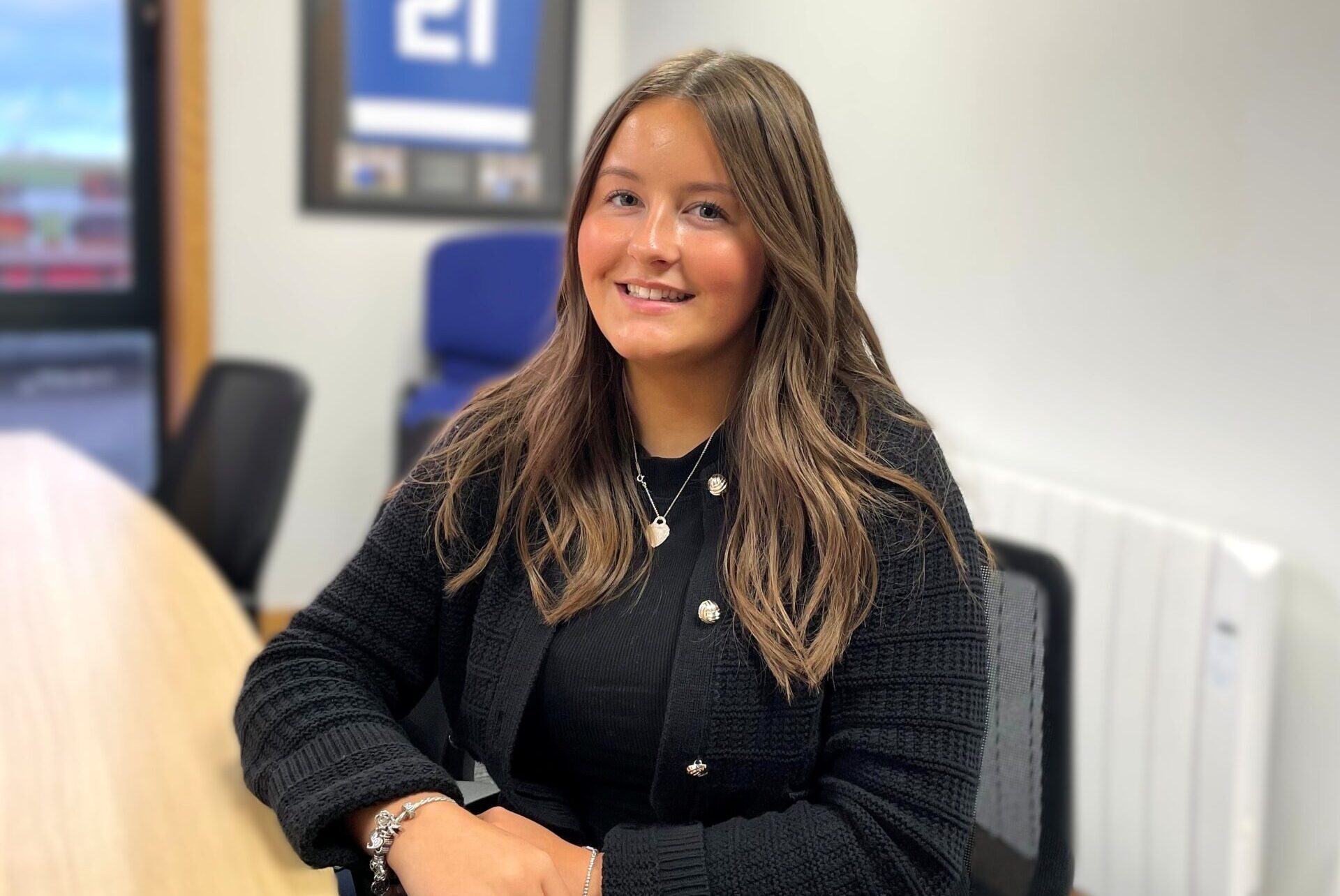 Kirsten Black, KR Group staff member sitting at the board room table in their offices in Newburgh, Aberdeenshire.